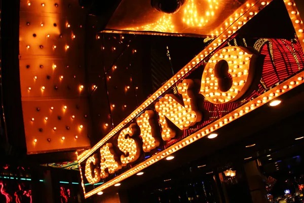 Golden Toad slot game interface showing five reels and bonus features